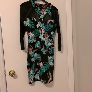 Woman’s  Large floral ,fitting , dress